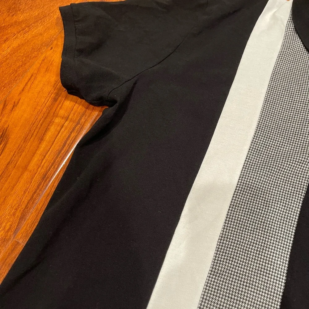 Stylish Black Polo Shirt with White Accents - Picture 3 of 10